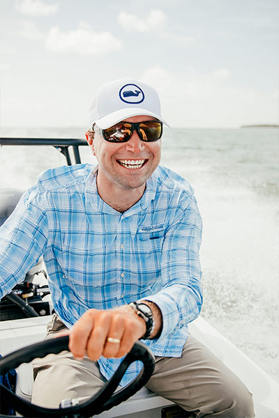 man driving boat