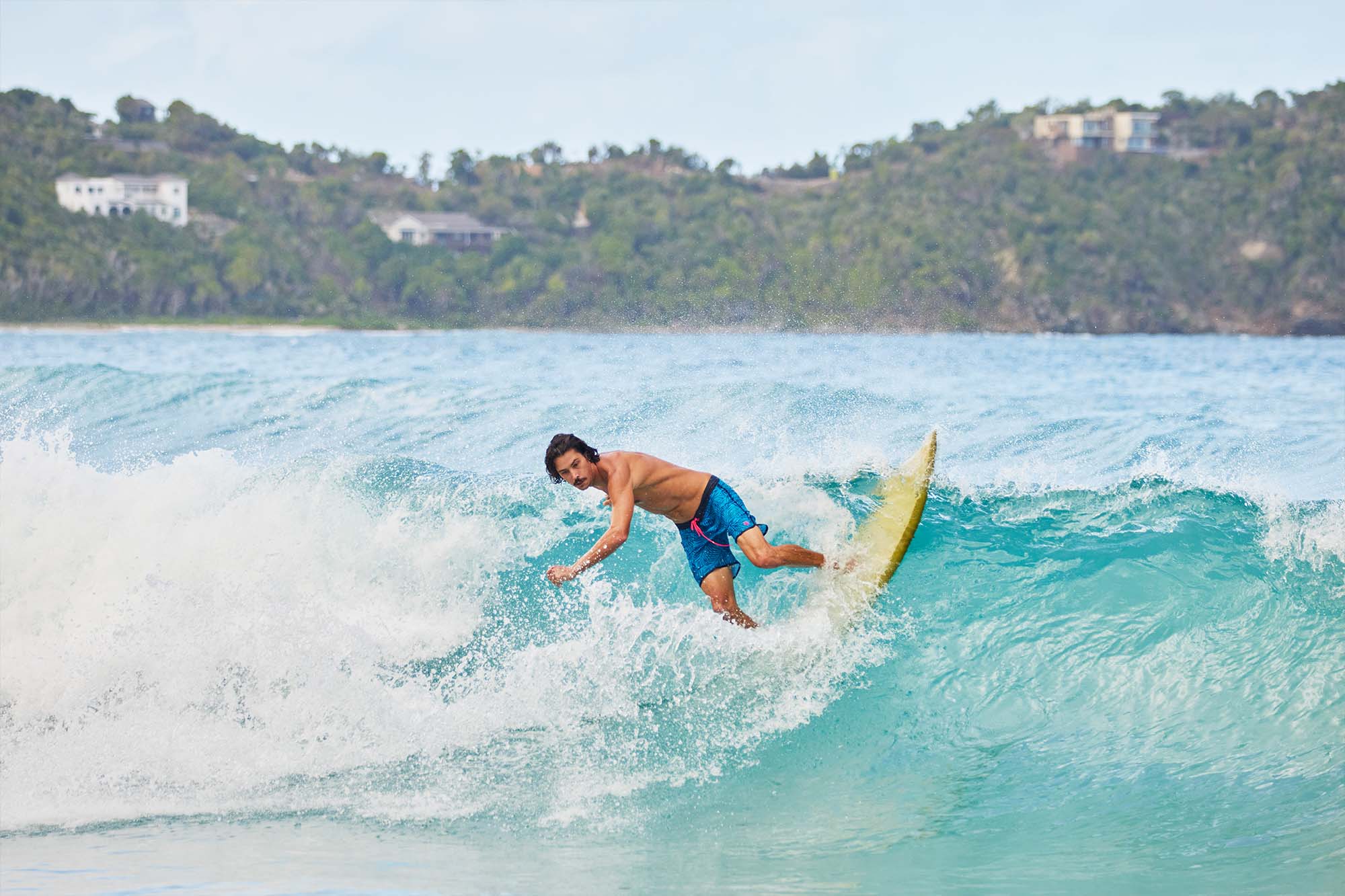 Adam Crook surfing